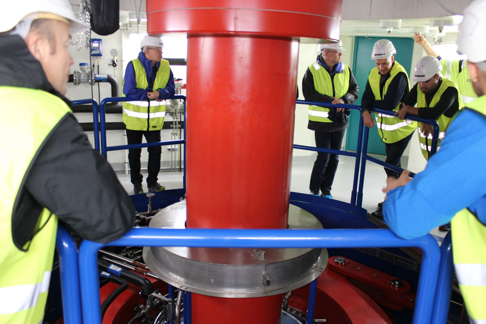 Attentive listeners on tour in Lyses new hydro power plant, Lysebotn II.