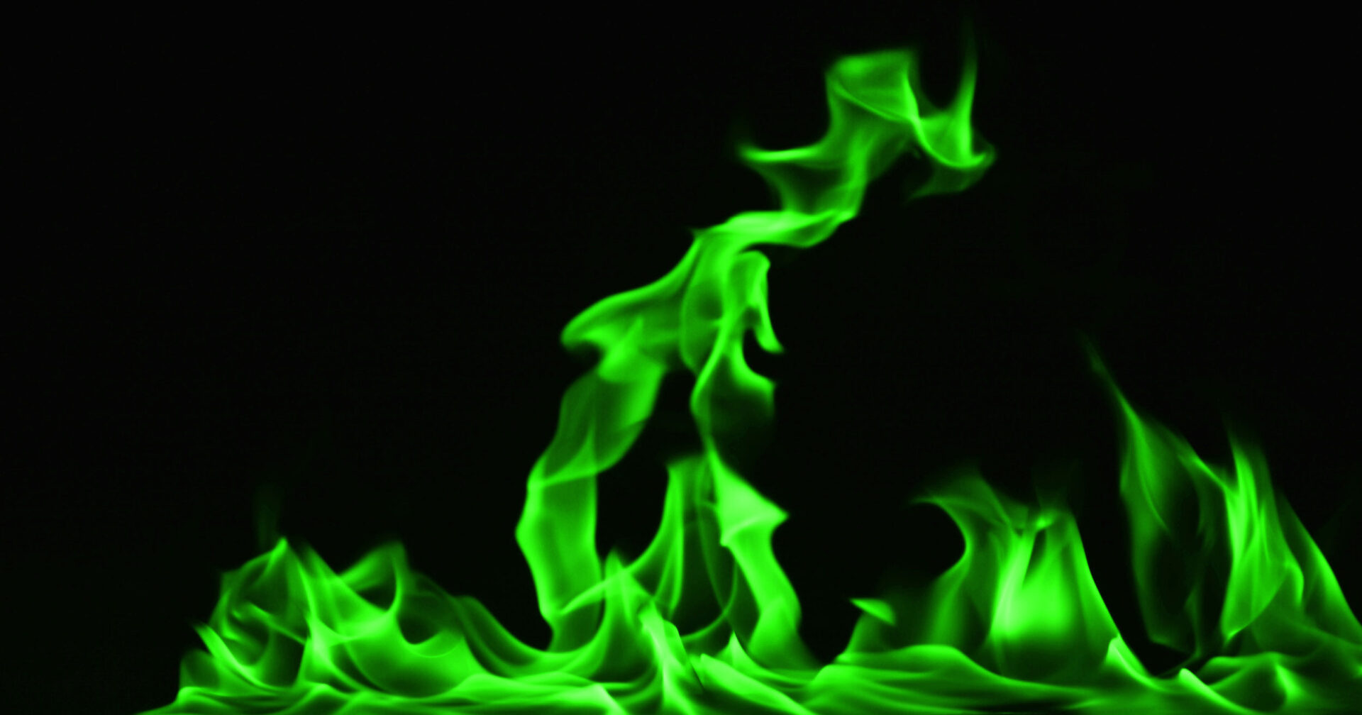 Green flames on black background