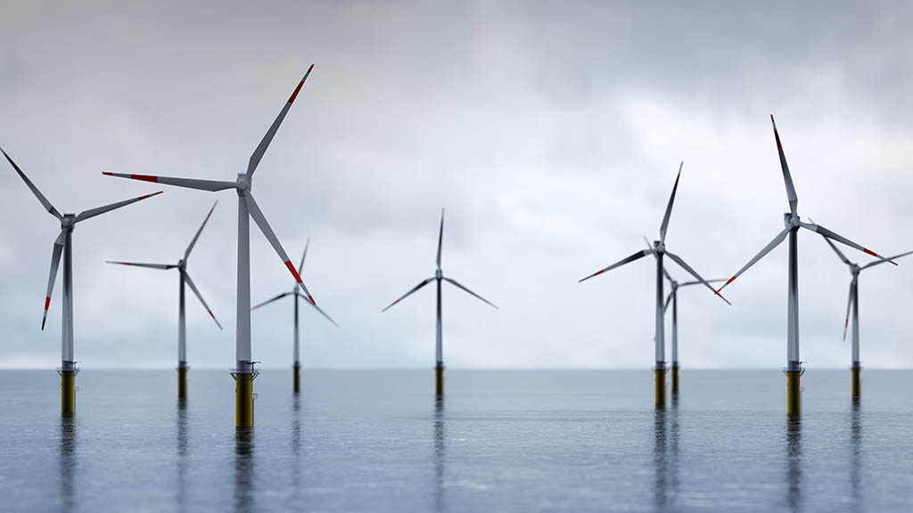 Offshore wind turbines farm on the ocean. Sustainable energy