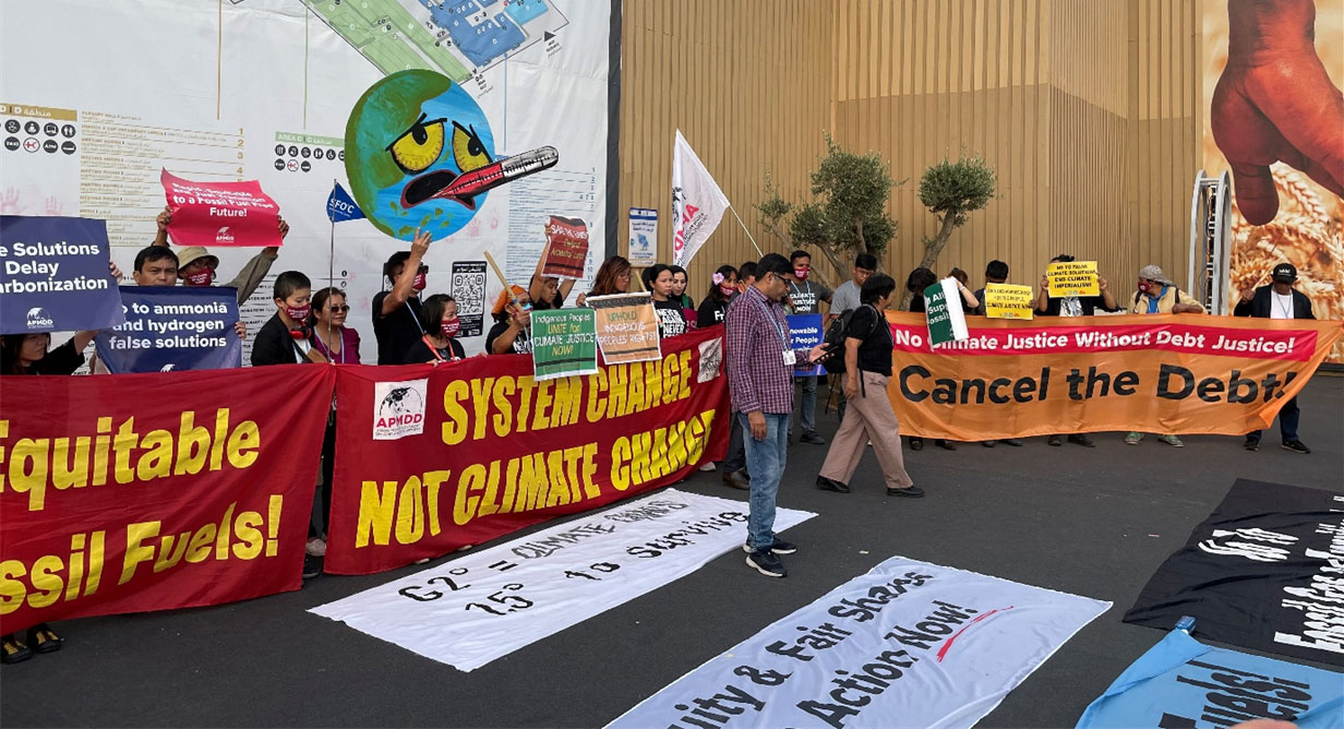 Demonstrasjon inne på COP-området for klimarettferdighet og for sletting av ulandsgjeld.