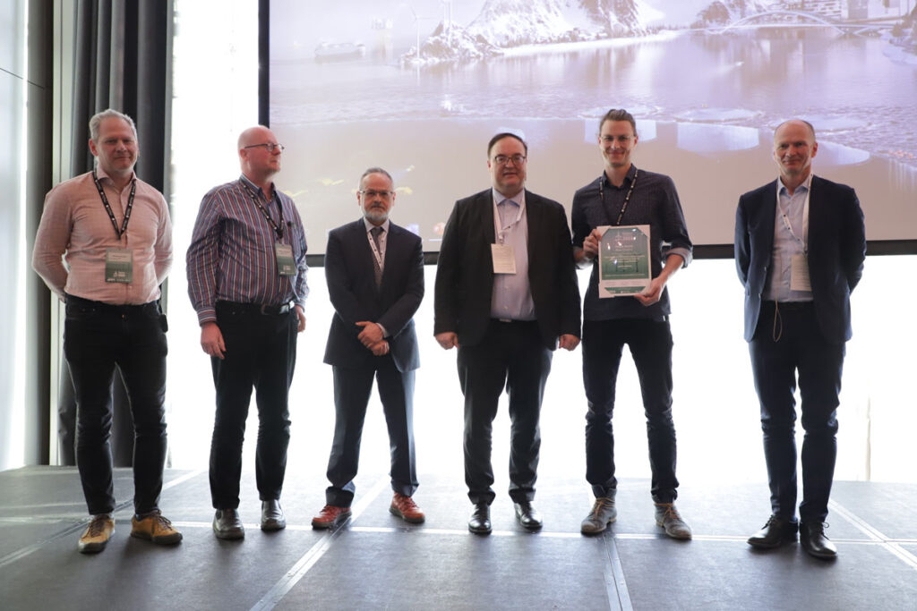 Left to right: members of the jury Michael Muskulus, NTNU, DeepWind co-chair; Arnoldus van Wingerde, Fraunhofer IWES; Anaya-Lara, Olimpo, University of Strathclyde; Trond Kvamsdal, NTNU, DeepWind co-chair; Jannis Wacke, DTU, award winner for Best Content; John Olav Tande, DeepWind co-chair.