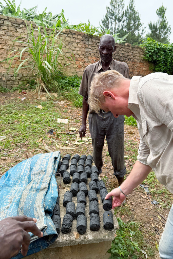 Morten Seljeskog inspects charcoal briquettes